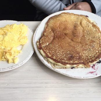 Yards Bruncheon - Huckleberry pancake with side of scrambled eggs - New American Near Me - Spokane, Washington Yards Bruncheon - Huckleberry pancake with side of scrambled eggs - New American Near Me - Spokane, Washington