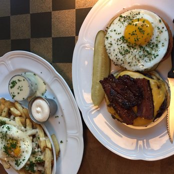 Au Cheval - Cheeseburger + fried egg and Fries with Mornay sauce garlic aioli + fried egg - Bars Near Me - Chicago, Illinois