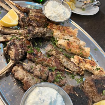 Karellas Cafe - Tsiknopempti platter with lamb chops, pork souvlaki, chicken souvlaki, and bifteki. The pork souvlaki was sooooo good - Greek Near Me - Baltimore, Maryland