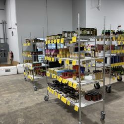 European Deli - Racks in the warehouse with mustard ketchup and pickles