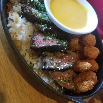 Earls Kitchen + Bar - Steak and coconut shrimp combo - New American Near Me - Miami, Florida Earls Kitchen + Bar - Steak and coconut shrimp combo - New American Near Me - Miami, Florida