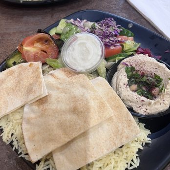 Kababstic Mediterranean Grill - The chicken kebab plate. Chicken is hidden under the pita. - Mediterranean Near Me - Arcadia, California Kababstic Mediterranean Grill - The chicken kebab plate. Chicken is hidden under the pita. - Mediterranean Near Me - Arcadia, California
