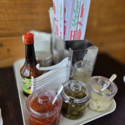 Condiments ready at your table