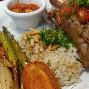 Byblos Restaurant - Lamb shank and sides at Byblos in Gainesville - Lebanese Near Me - Gainesville, Virginia