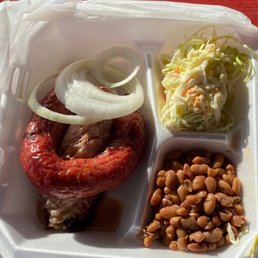 Awesome sausage! Ok brisket (needs sauce). Very good slaw. Surprising beans.