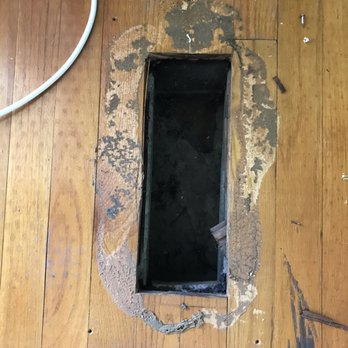C V Hardwood Flooring - damage from plate glued over vent - Flooring Near Me