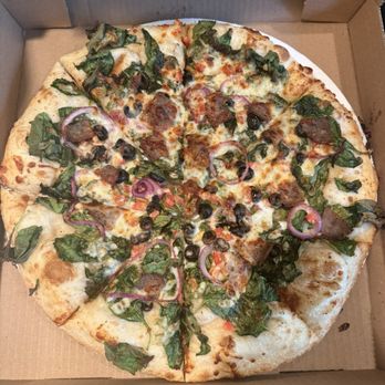 Dick's Pour House - Greek pizza. no bacon. Carry out (Large) - Burgers Near Me - Lake Leelanau, Michigan Dick's Pour House - Greek pizza. no bacon. Carry out (Large) - Burgers Near Me - Lake Leelanau, Michigan
