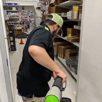 SERVPRO of Hurst-Euless-Bedford - Extracting water from a storage room. - Damage Restoration Near Me - Bedford, Texas