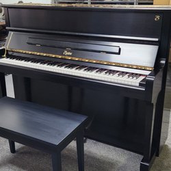 Pianos of Princeton - And a repair shop.