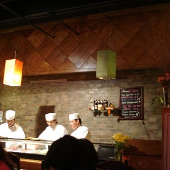 Sushi Katsu - The Sushi Chefs behind the Sushi Bar counter, busy busy busy preparing the sushi - Sushi Bars Near Me - Aurora, Colorado