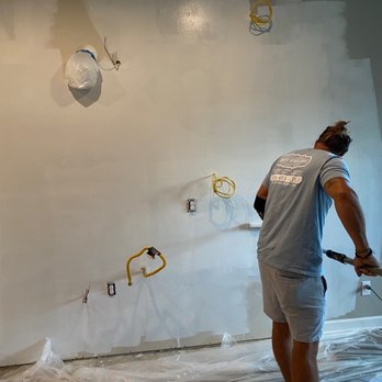 Daniel Krause Renovations - a man painting a wall - General Contractors Near Me - Charlotte, North Carolina Daniel Krause Renovations - a man painting a wall - General Contractors Near Me - Charlotte, North Carolina
