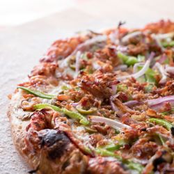 Villages Pizza  - Mr. Mozzarella -  Fresh sliced mushrooms, pepperoni, green peppers, red onions, home-cooked bacon & green or black olives