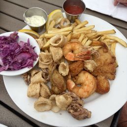 Cold ass food. One oyster. Fill with cold calamari we hated and left. It was horrible Cold ass food. One oyster. Fill with cold calamari we hated and left. It was horrible