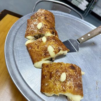 Lucino's Pizza - Cheesesteak Stromboli with a pretzel crust - Pizza Near Me - Las Vegas, Nevada