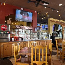 Chip & salsa bar. Self-serve drinks to the left. Chip & salsa bar. Self-serve drinks to the left.