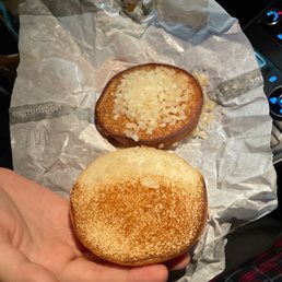 A bun with onions, was supposed to be double hamburger