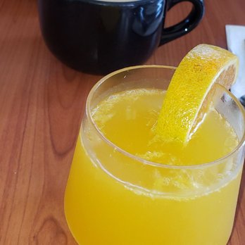 Cafe M - Mimosa with Fresh squeezed orange juice and a latte - Breakfast & Brunch Near Me - Berkeley, California Cafe M - Mimosa with Fresh squeezed orange juice and a latte - Breakfast & Brunch Near Me - Berkeley, California