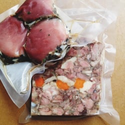 Countryside Family Farm - More Charcuterie: Caul fat wrapped loin and Wild Hog Headcheese