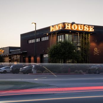 Pinthouse Pizza - Pinthouse exterior light trails by losiento. - Brewpubs Near Me - Round Rock, Texas