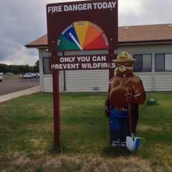 Conejos Peak Forest Service Ranger District Field Office - Old Smokie out front giving the fire danger report today.