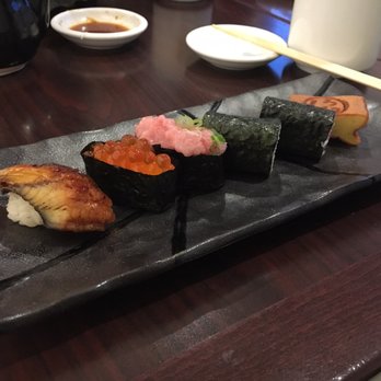 Shiro's - Final course: sushi. Eel, salmon roe, toro, Japanese yam, tuna, and egg - Sushi Bars Near Me - Seattle, Washington