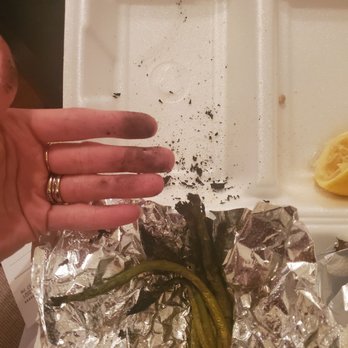 O'Charley's Restaurant & Bar - a person holding a piece of foil with a plant in it - American Near Me - Gallatin, Tennessee O'Charley's Restaurant & Bar - a person holding a piece of foil with a plant in it - American Near Me - Gallatin, Tennessee