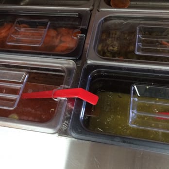 El Taquito - Salsa bar. The red one on the left is spicy! But amazing. - Mexican Near Me - Newnan, Georgia