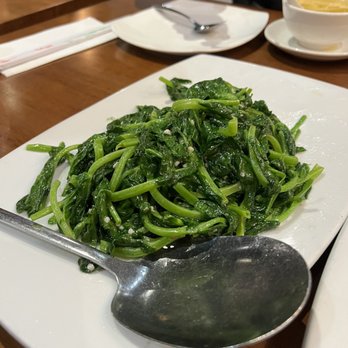 Frying Fish - Pea Vine with Garlic - Szechuan Near Me - Bellevue, Washington Frying Fish - Pea Vine with Garlic - Szechuan Near Me - Bellevue, Washington