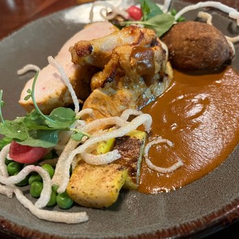 Tiffins Restaurant - Butter Chicken - New American Near Me - Lake Buena Vista, Florida Tiffins Restaurant - Butter Chicken - New American Near Me - Lake Buena Vista, Florida