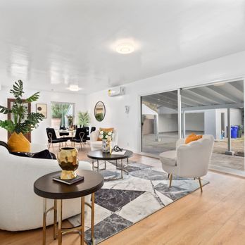 Golden State Floors - a living room with white walls and wood floors - Flooring Near Me - Anaheim, California Golden State Floors - a living room with white walls and wood floors - Flooring Near Me - Anaheim, California