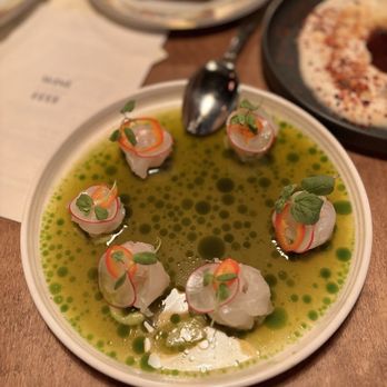 The Black Cat - Halibut crudo in front of whipped feta and warm bread - Wine Bars Near Me - Livermore, California