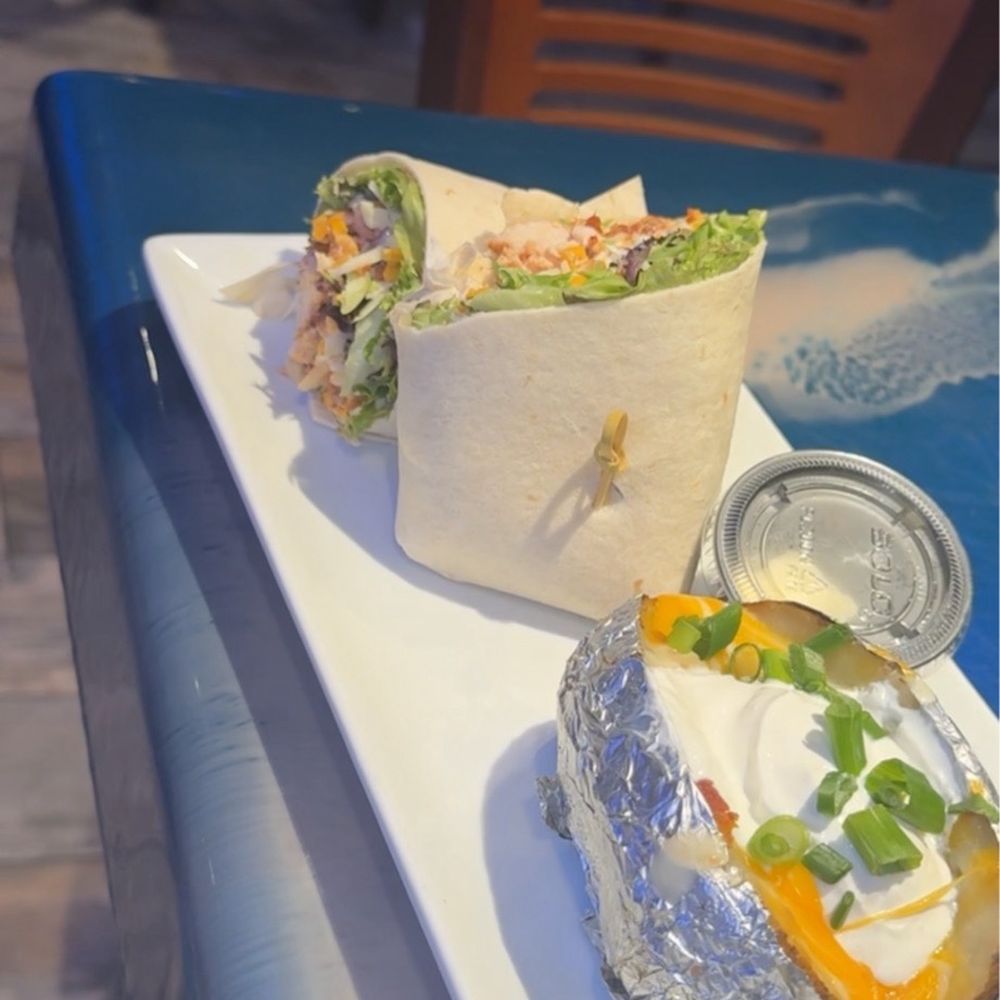 Coconuts On The Beach - Chipotle Wrap with Baked Potato - Bars Near Me - Cocoa Beach, Florida Coconuts On The Beach - Chipotle Wrap with Baked Potato - Bars Near Me - Cocoa Beach, Florida