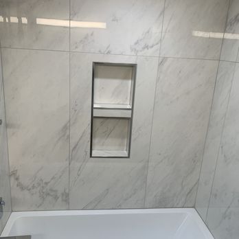 Huard Custom Stone and Tile - porcelain marble looking tiles . - Fireplace Services Near Me Huard Custom Stone and Tile - porcelain marble looking tiles . - Fireplace Services Near Me