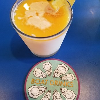 Boat Drinks - Pina colada with dark rum floater - Cocktail Bars Near Me - St. Augustine, Florida Boat Drinks - Pina colada with dark rum floater - Cocktail Bars Near Me - St. Augustine, Florida