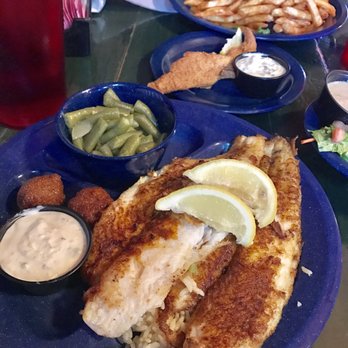 Cherry Creek Catfish - Two catfish fillets with Cajun spices. (Comes with rice, beans, corn nuggets (2), salad) $10.99 - Seafood Near Me - Austin, Texas Cherry Creek Catfish - Two catfish fillets with Cajun spices. (Comes with rice, beans, corn nuggets (2), salad) $10.99 - Seafood Near Me - Austin, Texas