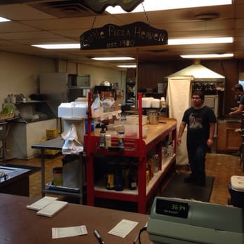Little Pizza Heaven - a man standing in a kitchen - Pizza Near Me - Caruthersville, Missouri
