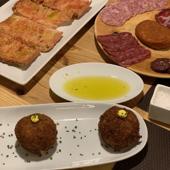Teòric - Chicken and prawn croquettes (delicious), assorted Spanish cured meats (some were very good, others were just ok) and pan con tomate (good). - Tapas Bars Near Me - Barcelona, B Teòric - Chicken and prawn croquettes (delicious), assorted Spanish cured meats (some were very good, others were just ok) and pan con tomate (good). - Tapas Bars Near Me - Barcelona, B