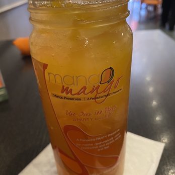 Mango Mangeaux - Mango iced tea - New American Near Me - Hampton, Virginia Mango Mangeaux - Mango iced tea - New American Near Me - Hampton, Virginia