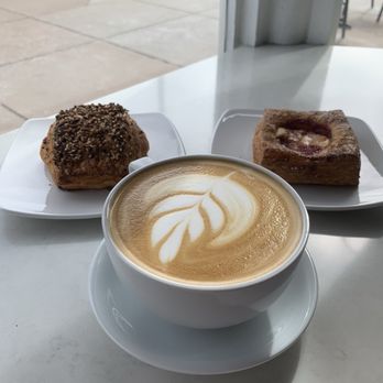 Roast Coffee Bar - a cup of cappuccino and two pastries - Coffee & Tea Near Me - Denver, Colorado