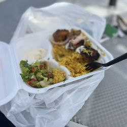 El Prince Restaurant - Hot steamy yellow spice rice and soft chicken kebab..