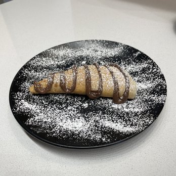 The Crepevine - Dessert crepe (half)... bananas, kiwi, strawberries and Nutella - Creperies Near Me - Ormond Beach, Florida