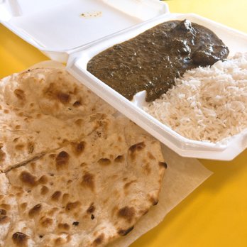 Krishna Indian Restaurant Carry Out - Lamb saag with naan bread. Not the prettiest thing, but it's still tasty and satisfying to eat! - Indian Near Me - Cincinnati, Ohio