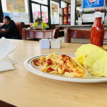 Famous Burgers - a plate of fries and ketchup - Burgers Near Me - Long Beach, California Famous Burgers - a plate of fries and ketchup - Burgers Near Me - Long Beach, California