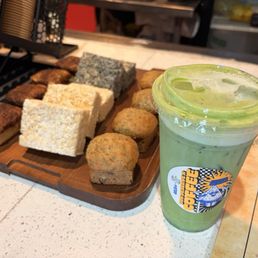 Iced matcha latte Coffee cake (vegan) Rice crispy treats (vegan) Banana bread (vegan)