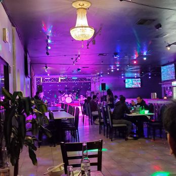 Nhích Restaurant - Inside with stage - Vietnamese Near Me - Seattle, Washington Nhích Restaurant - Inside with stage - Vietnamese Near Me - Seattle, Washington