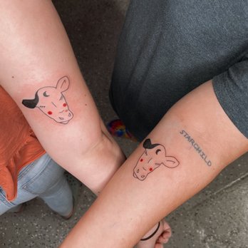 Bold Stroke Tattoo Studio - Matching cow tattoos from Ricky - Piercing Near Me - Dallas, Texas