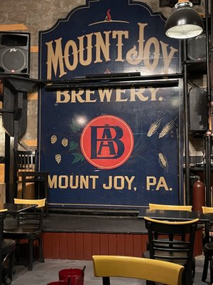 Photo of Bube's Brewery - Mount Joy, PA, US. Brewery sign inside the bar