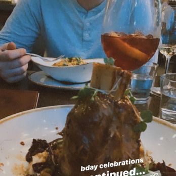 Woodblock - Braised Pork Shank and Sangria, can't remember what my bf had but a seafood pasta - Cocktail Bars Near Me - Redmond, Washington