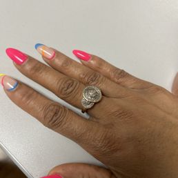My nails are done by Q