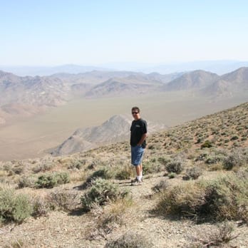 Rohan & Sons - a man standing on a mountain top - General Contractors Near Me - San Clemente, California Rohan & Sons - a man standing on a mountain top - General Contractors Near Me - San Clemente, California